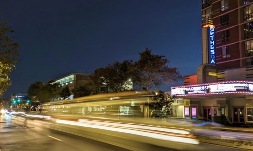 streets at night showing diner storefronts