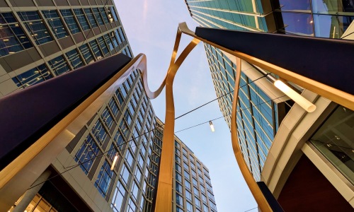 view of nearby city buildings from the ground level