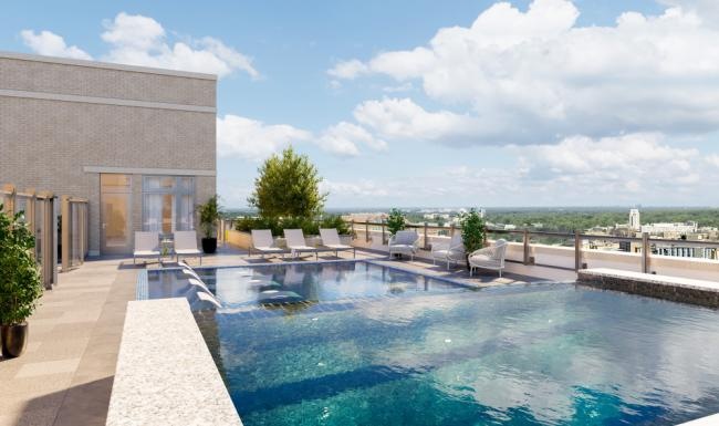 Relax and unwind poolside a swimming pool outside a building